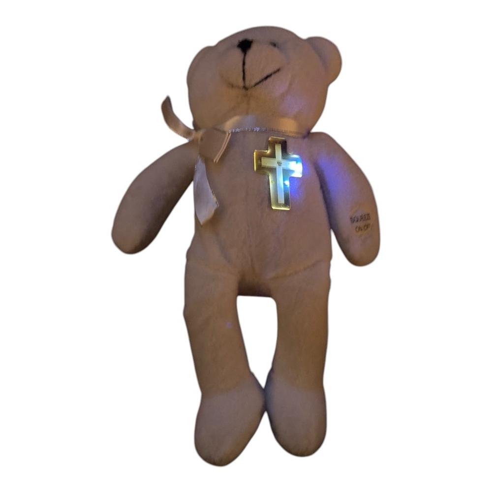 Brite Spots™ Spirit Bears with light up cross badges and a white satin bow sings